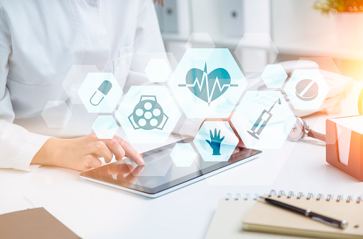 doctor working on ipad