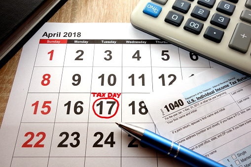 calendar with tax day circled on it