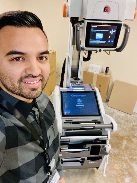 Image of David Ruiz with Carestream mobile imaging product