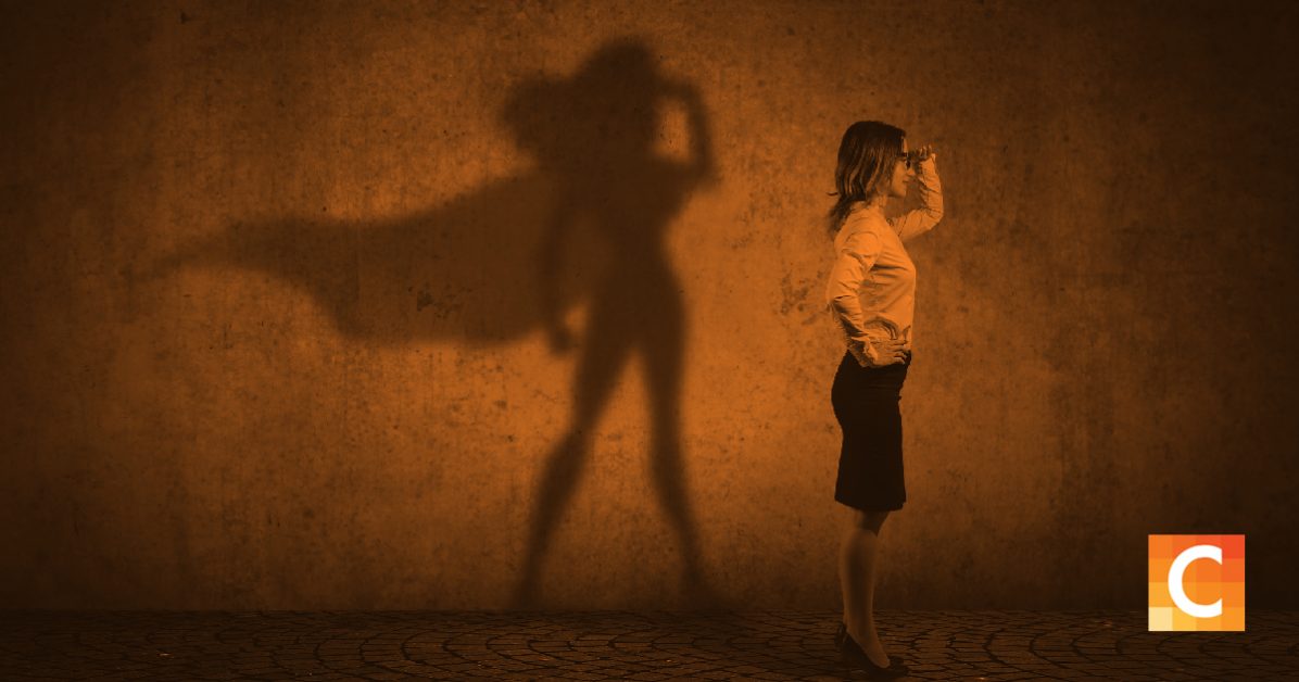 Image of a women with a super hero shadow. 