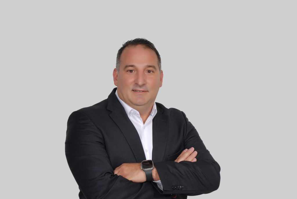 headshot for President of Consumables, Tasos Strouzos